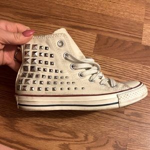 Gently used high top Converse with studs.